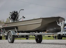 Gray boat standing on the ground