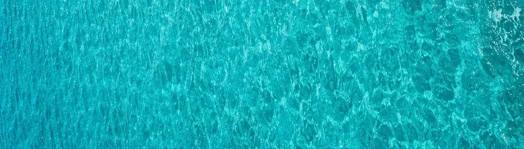 Clear turquoise sea water with gentle ripples