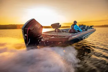 RANGER Z519 bass boat with Mercury motor speeding towards golden sunset